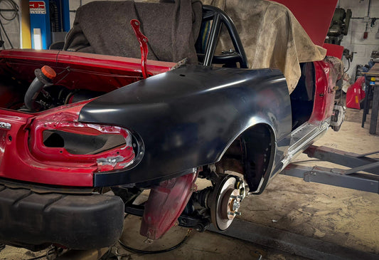 Mazda MX-5 NA roest- en schadeherstel met OEM zijschermen
